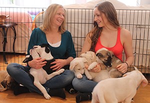Sharon and Sophia Silverman with new pups.